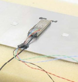 Piezo-composite transducer for mode and direction selectivity of Lamb waves